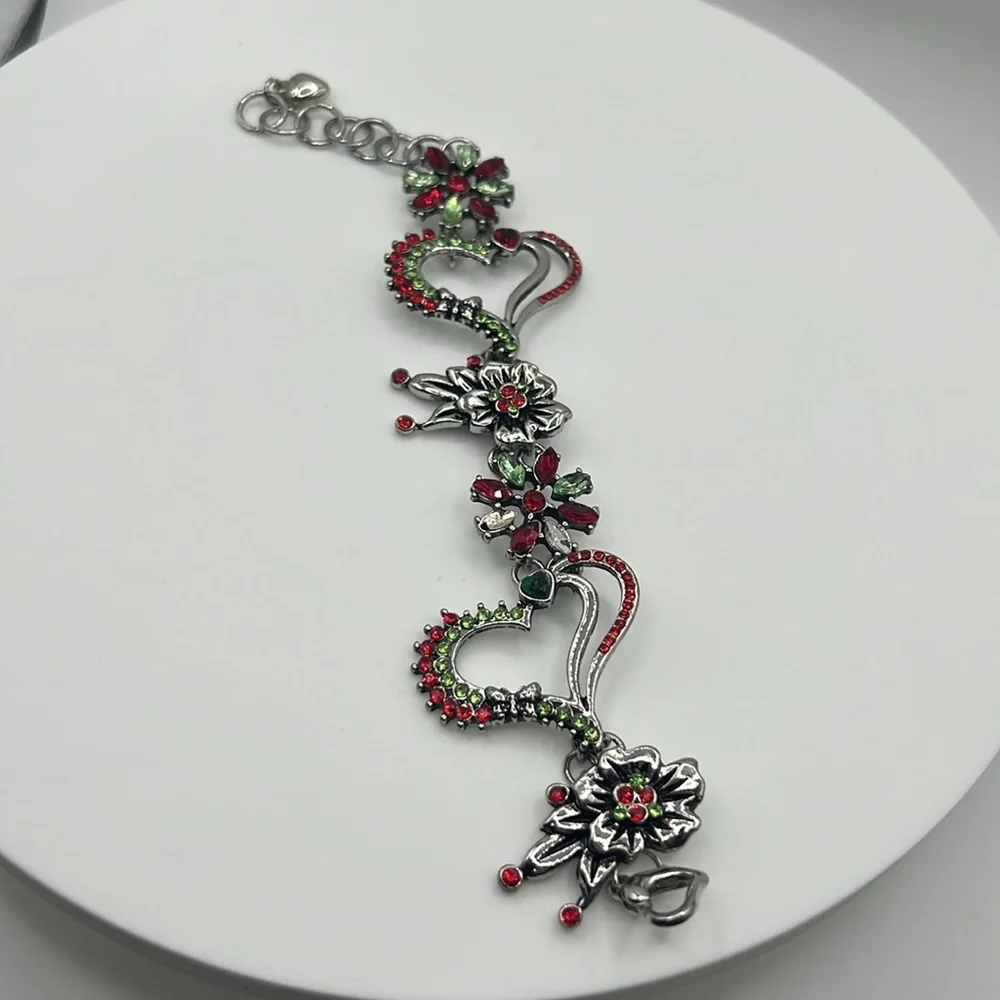 316. Elegant Silver and Red Floral Bracelet